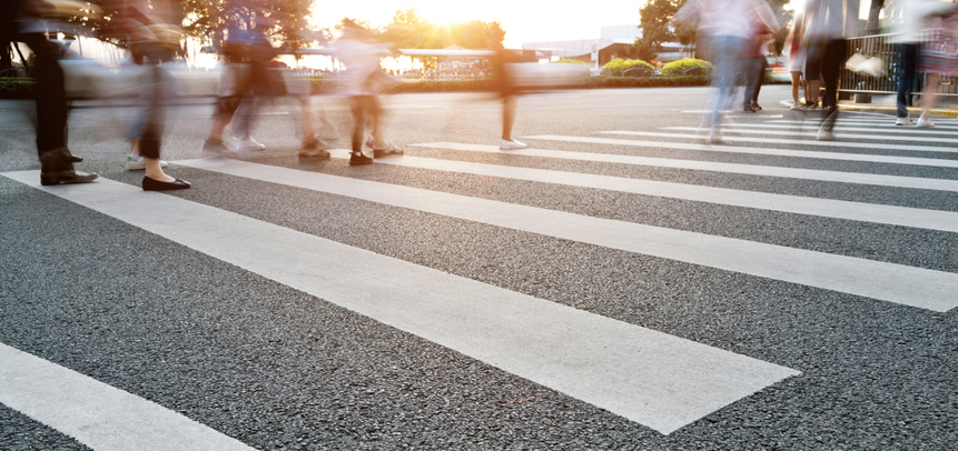 Group of people walking on the crosswalk
